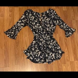 Free People Romper. Size M. Color black